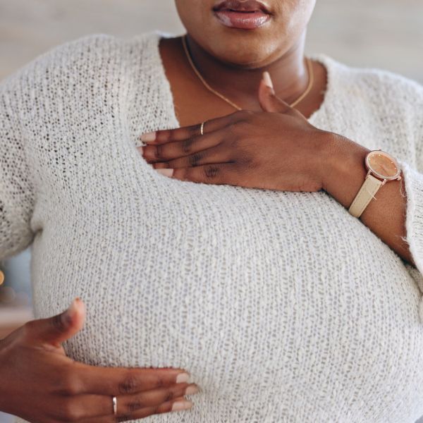 breast cancer- woman checking for lumps