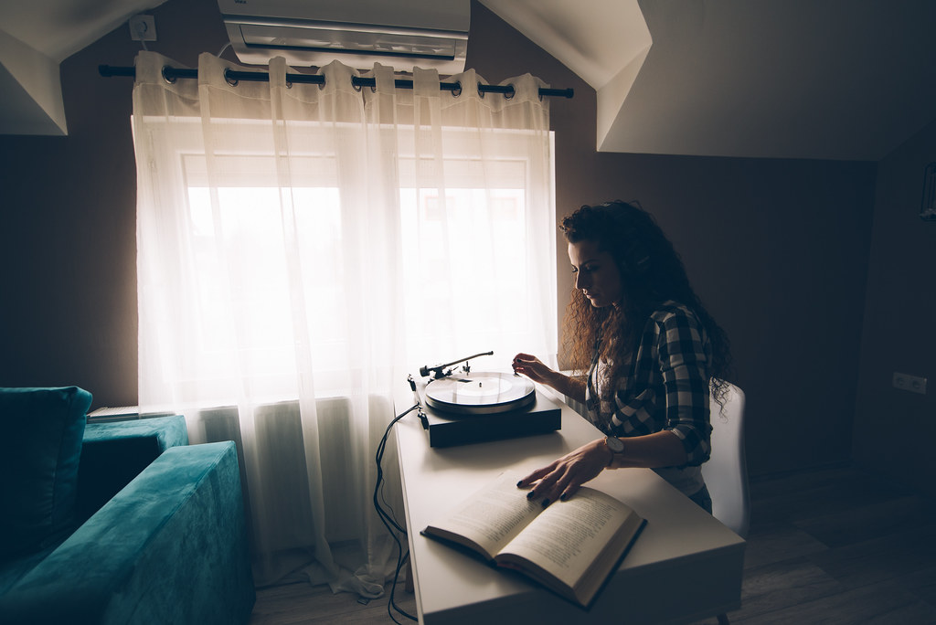 Woman resting calmly at home after recognizing signs of hormonal imbalance