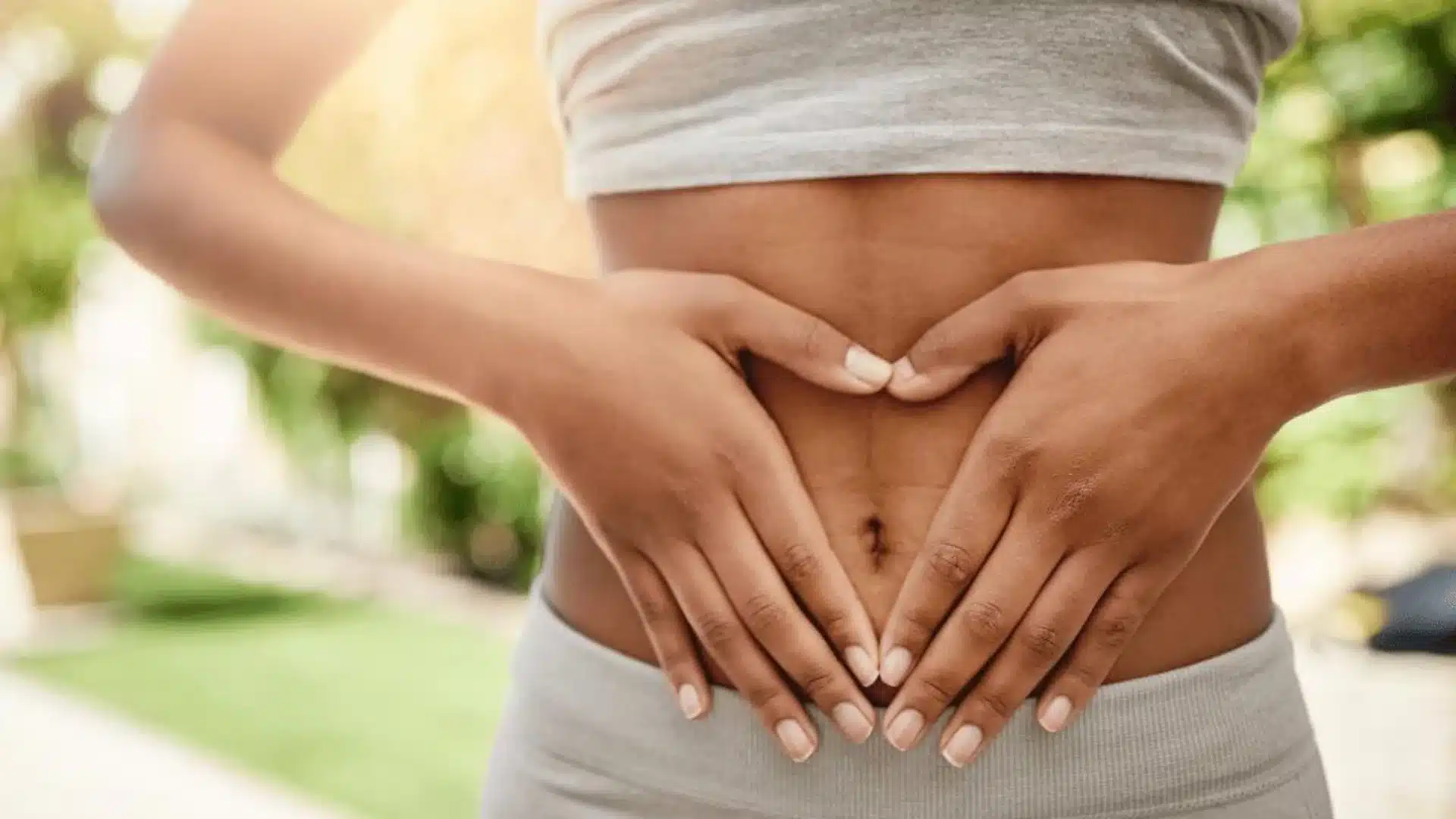 Woman supporting digestive and hormone health