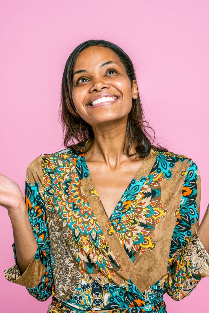 A smiling postmenopausal woman feeling confident and well